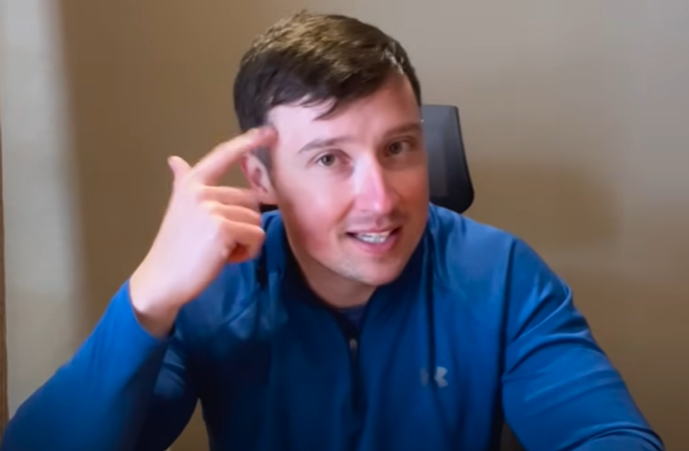 Slimmer James Marsden pointing at his head