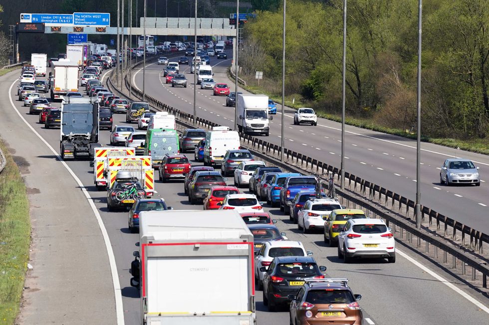 Slow moving traffic on the M5 near West Bromwich, West Midlands, during the Easter getaway. Picture date: Friday April 15, 2022.