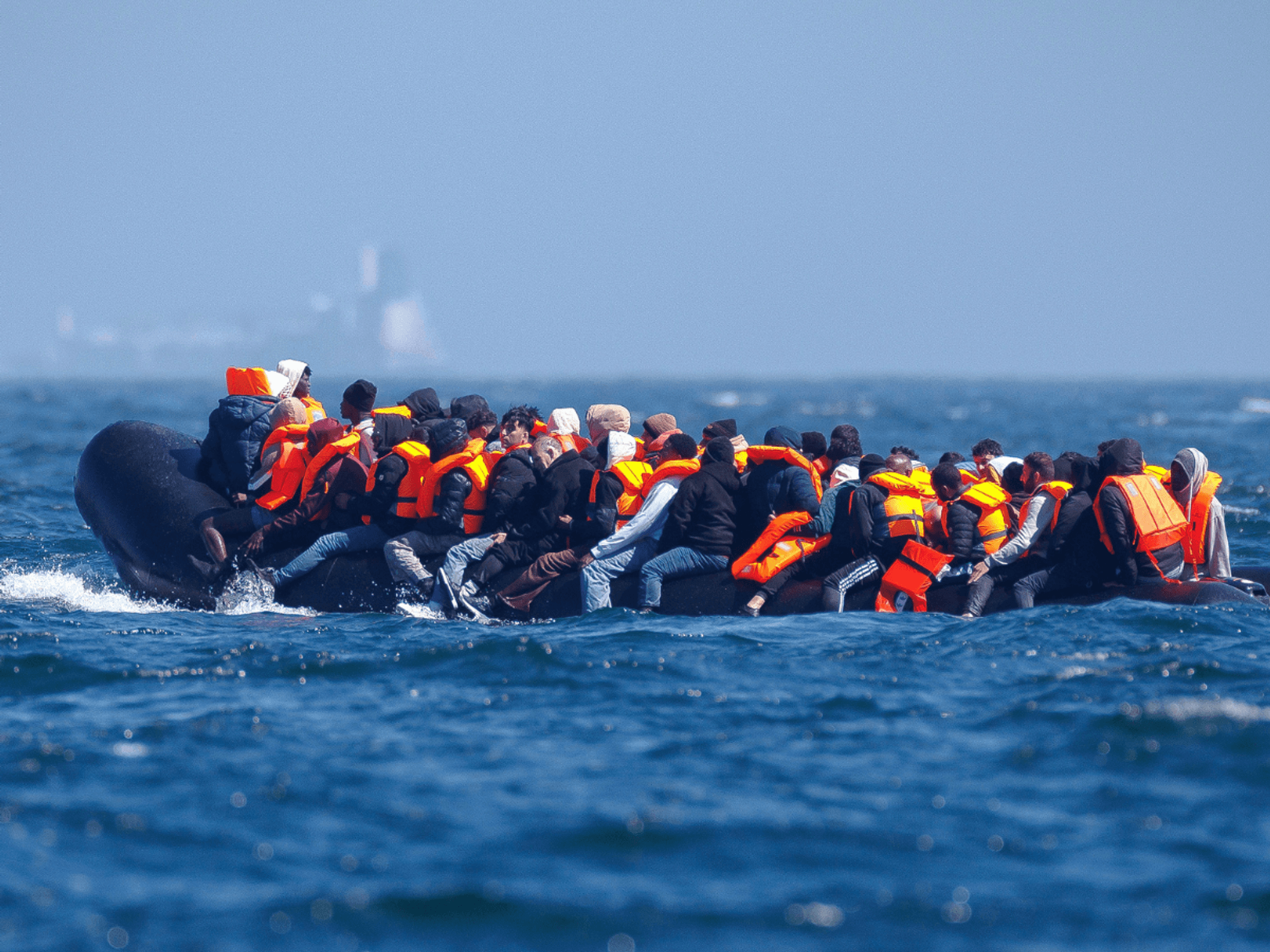 Small boat carrying migrants in the Channel