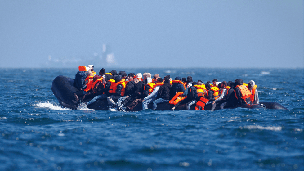 Small boat carrying migrants in the Channel