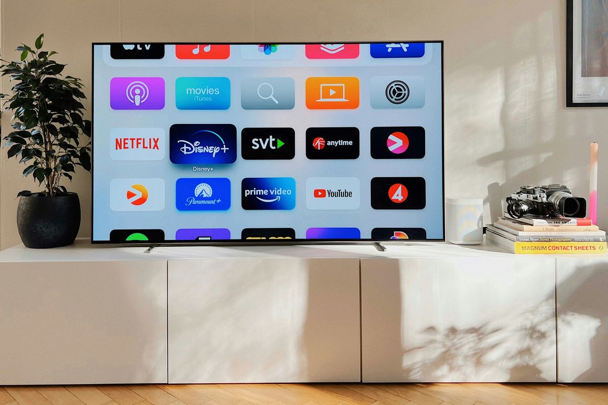 Smart TV flatscreen pictured on a media unit