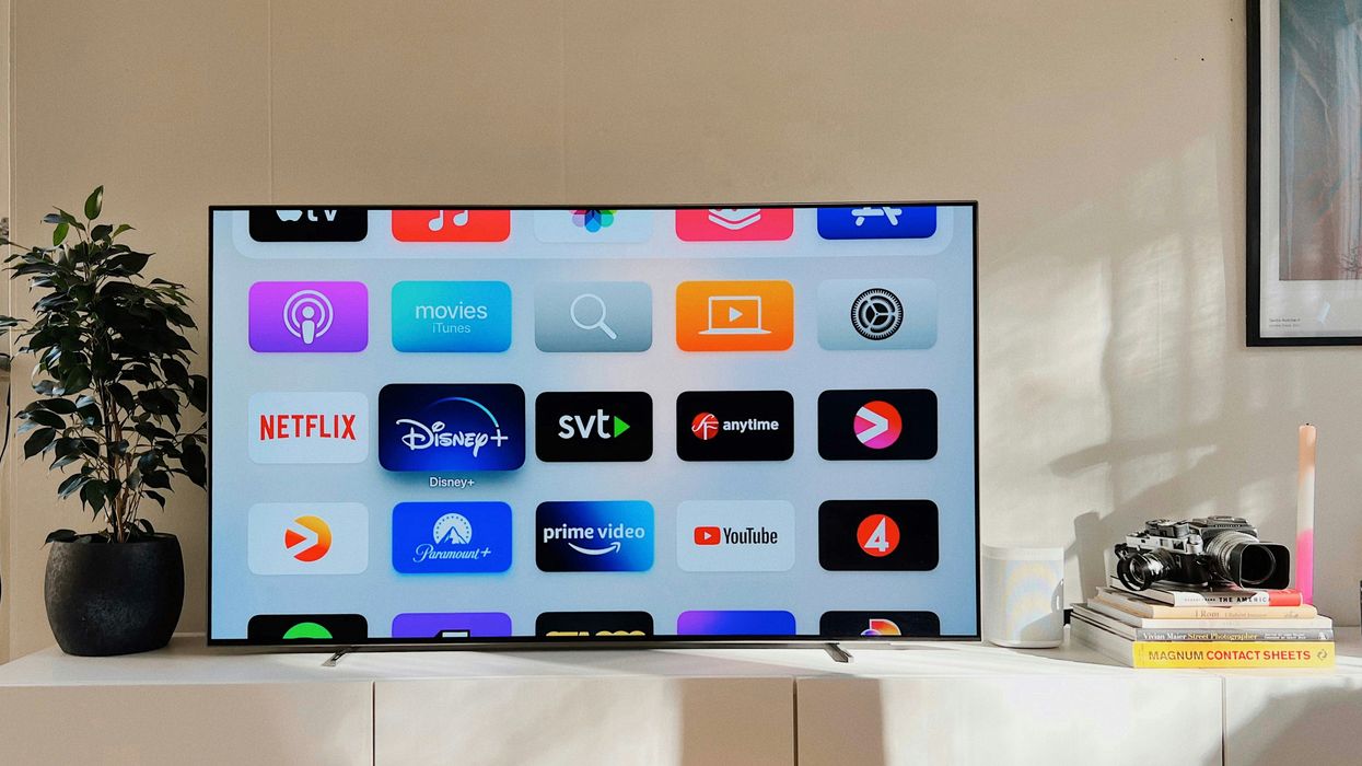 Smart TV flatscreen pictured on a media unit