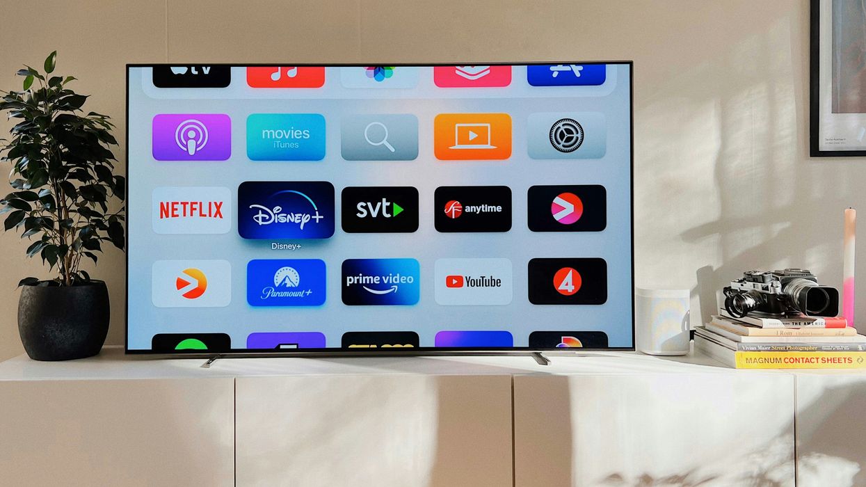 Smart TV flatscreen pictured on a media unit