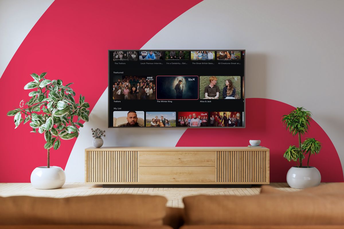 smart tv with freely on-screen and the freely logo in the background