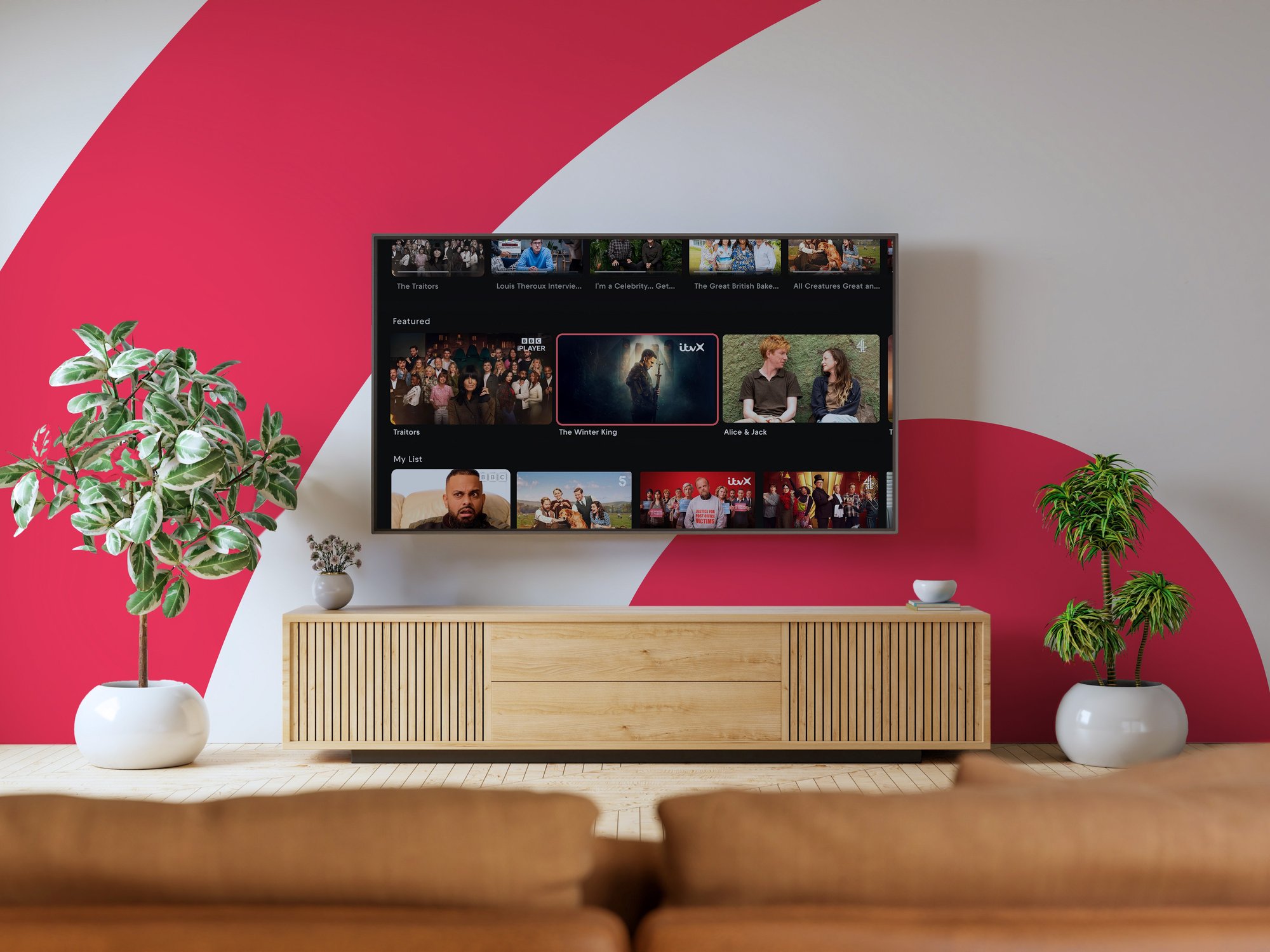 smart tv with freely on-screen and the freely logo in the background