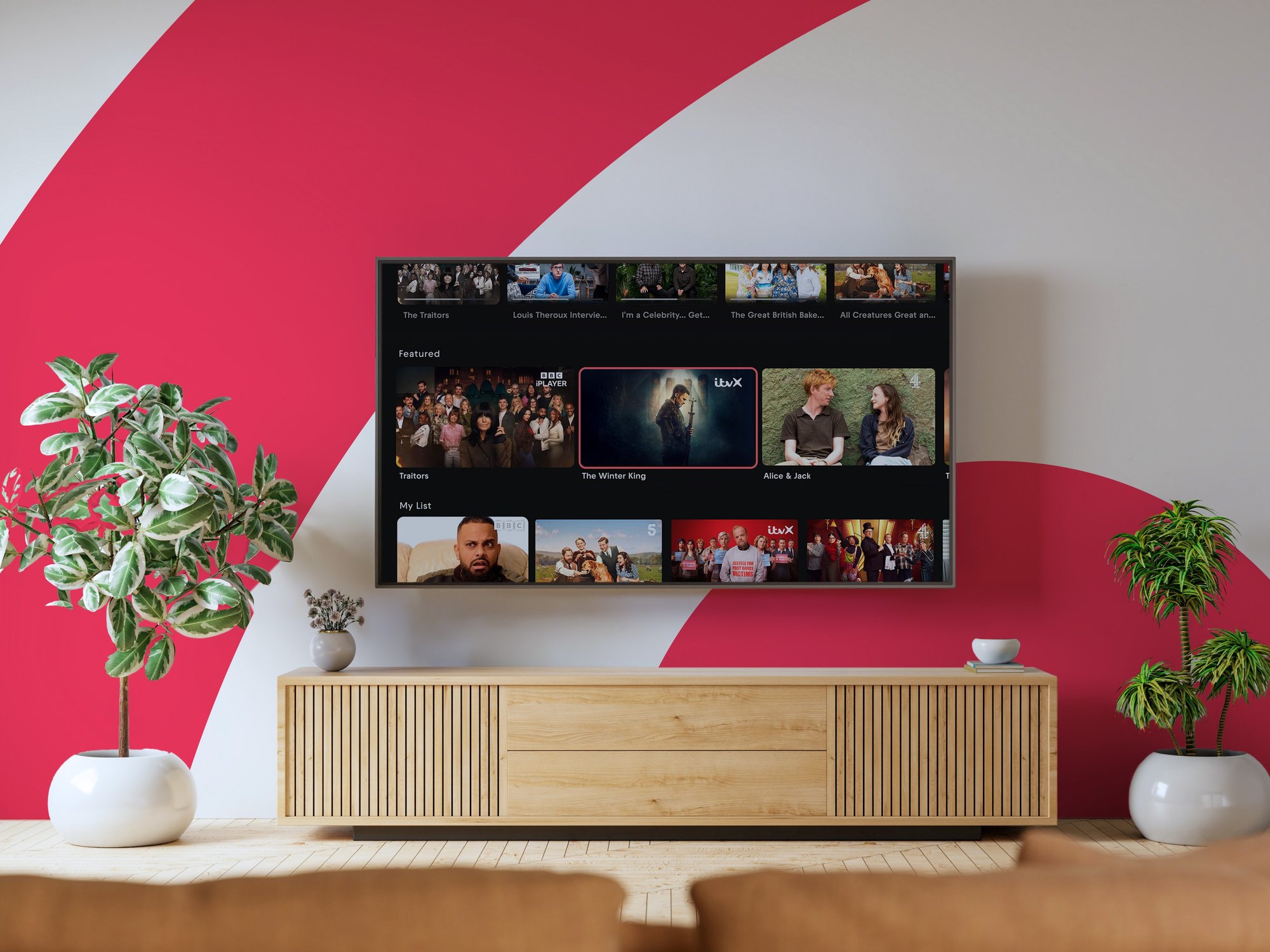 smart tv with freely on-screen and the freely logo in the background