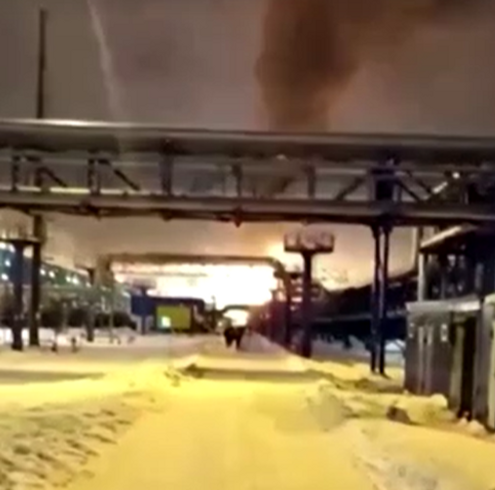 Smoke and fire seen at distance at Novatek facility