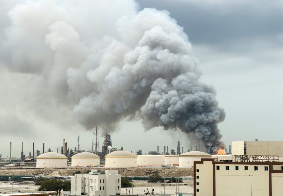 Smoke billows over an oil facility in Bahrain on Monday morning