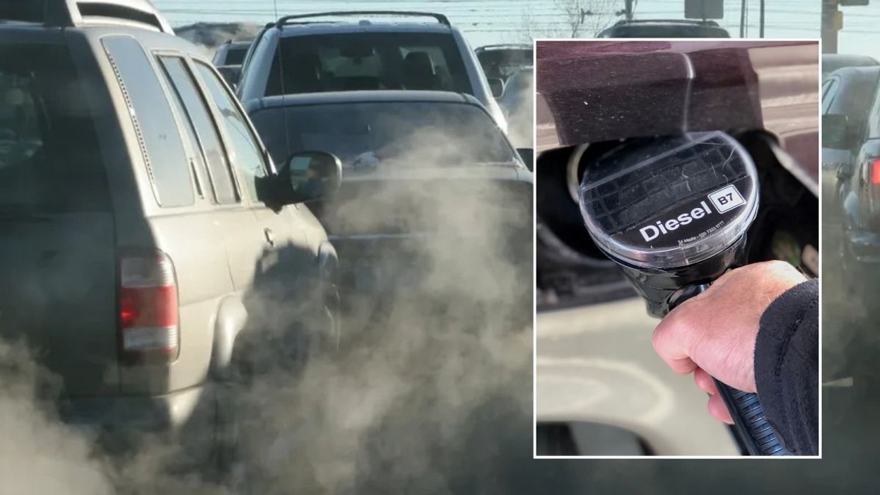 Smoke from car exhausts and a diesel pump