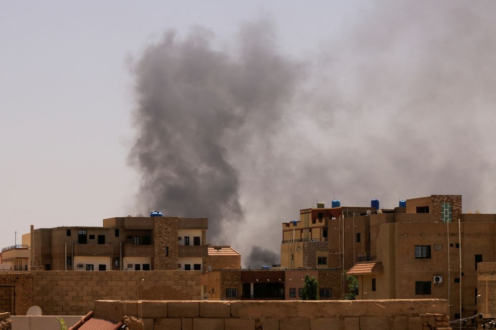 Smoke hangs over Khartoum