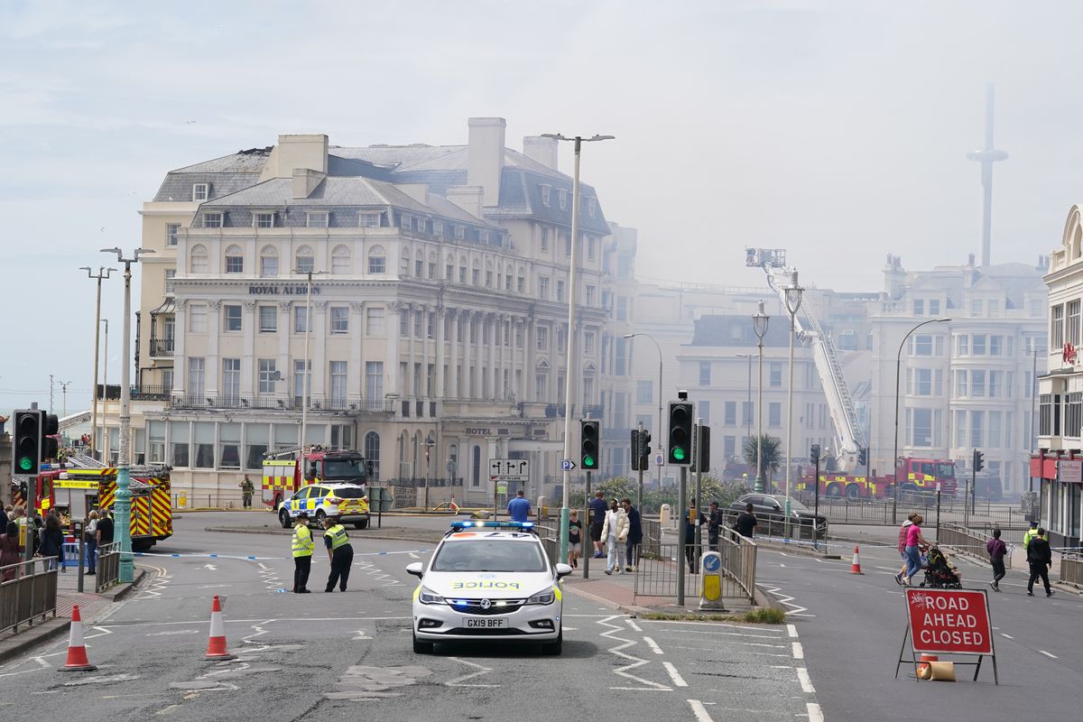 Blaze rips through historic Brighton hotel as strong winds hinder firefighters