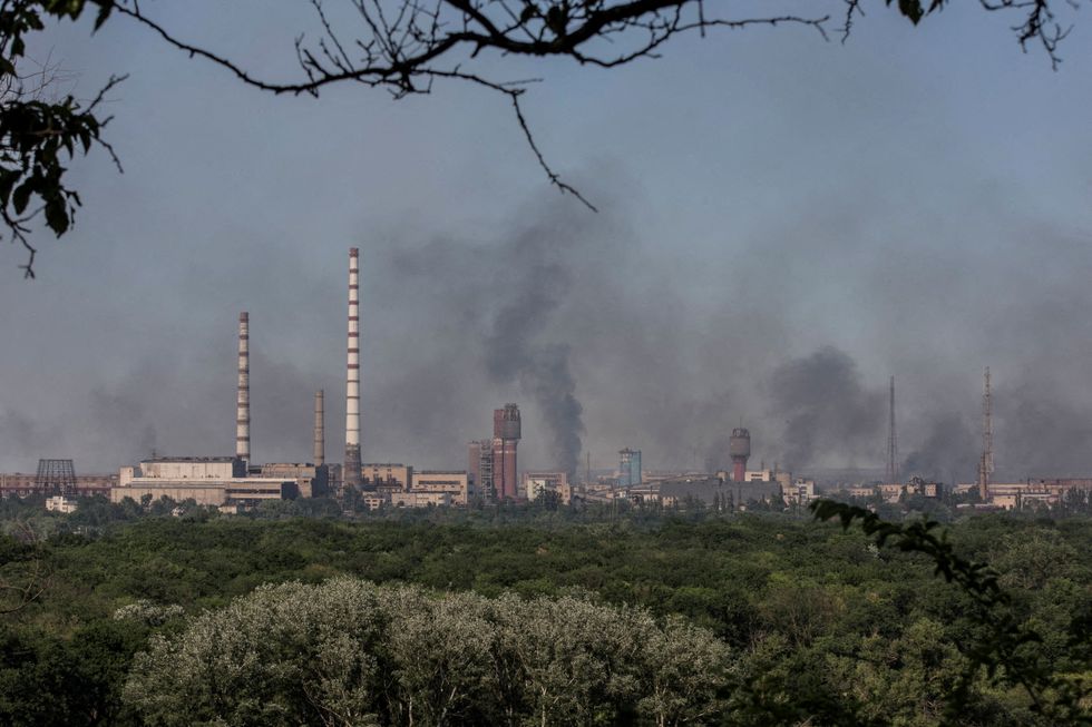 Smoke rises after a military strike on a compound of Sievierodonetsk's Azot Chemical Plant, amid Russia's attack on Ukraine, Lysychansk, Luhansk region, Ukraine.