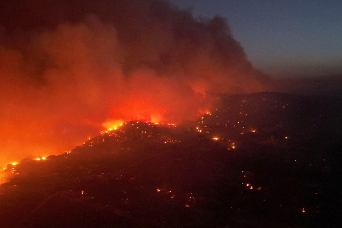 Smoke rises from a wildfire on the island of Rhodes, Greece, July 23, 2023