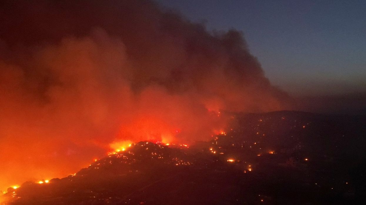 Smoke rises from a wildfire on the island of Rhodes, Greece, July 23, 2023