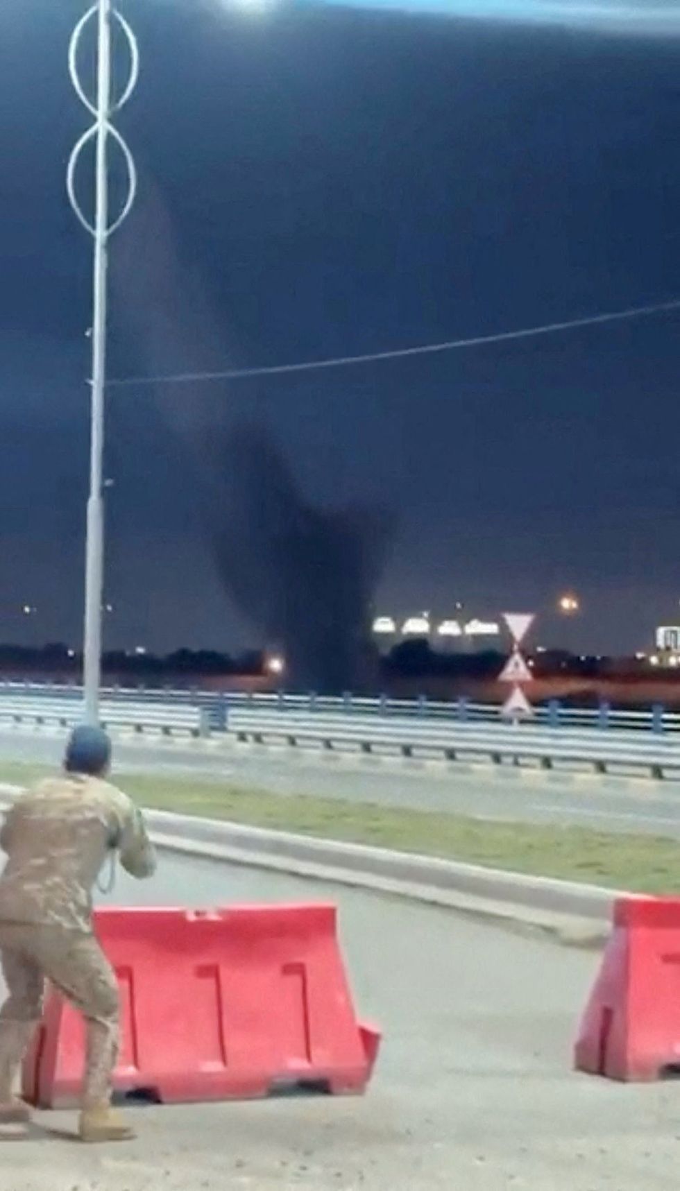 Smoke rises from debris during rocket and drone attacks