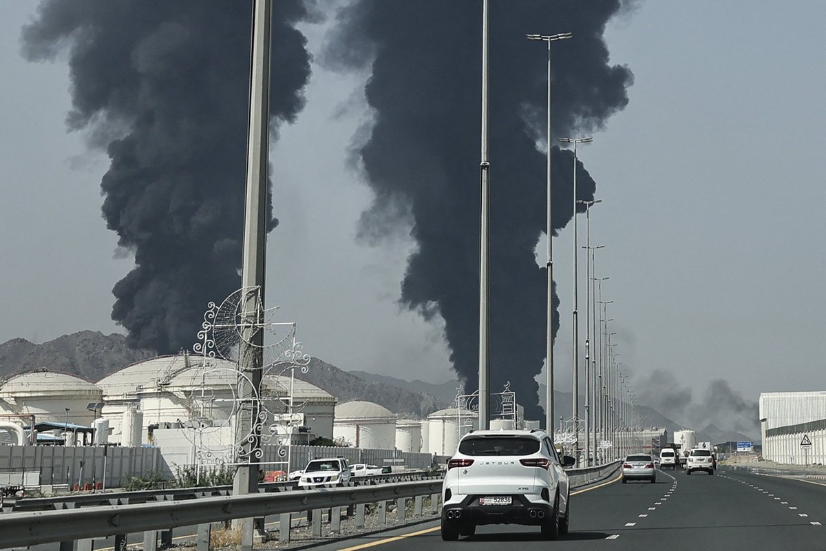 Smoke rises from the direction of an energy installation in the Gulf emirate of Fujairah on March 14, 2026