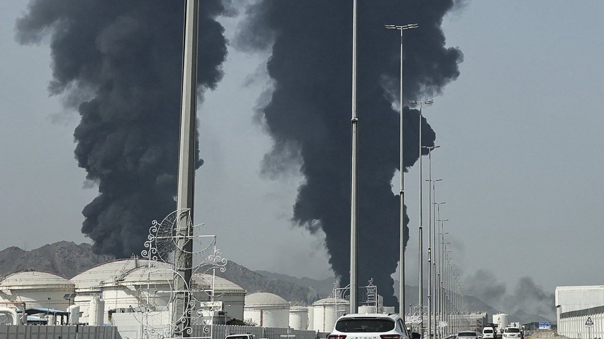 Smoke rises from the direction of an energy installation in the Gulf emirate of Fujairah on March 14, 2026