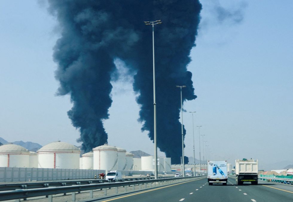 Smoke rises in the Fujairah oil industry zone