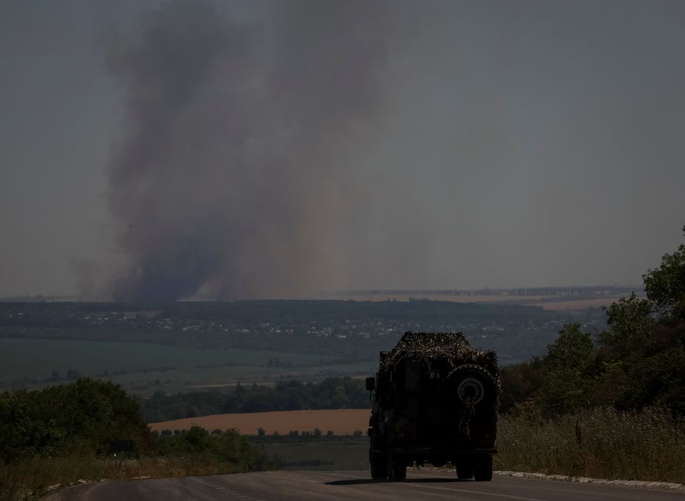 Smoke rises in the sky after shelling, amid Russia's attack, in Donetsk region, Ukraine July 7, 2022. REUTERS/Gleb Garanich