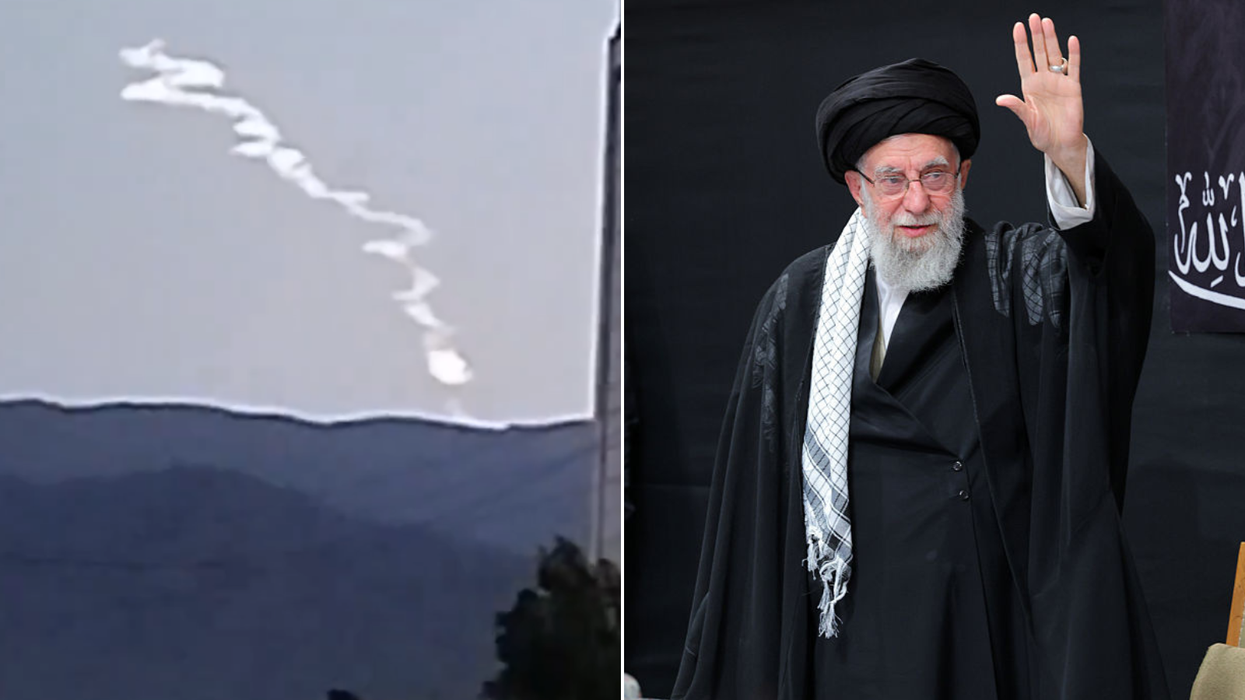 Smoke trail over Iran and Iranian Supreme Leader Ali Khamenei