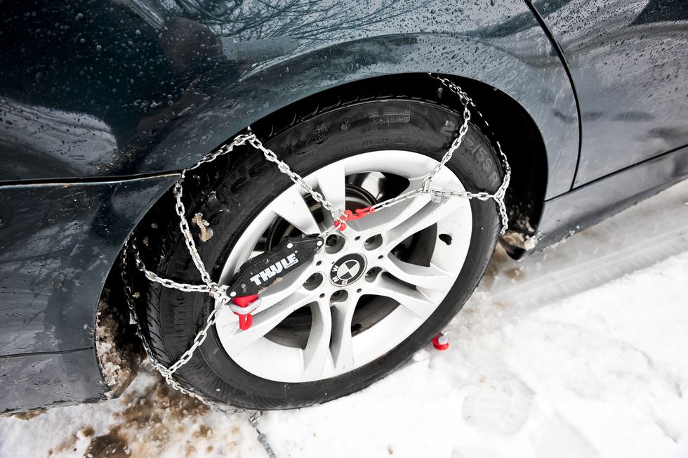 Snow chains on a tyre