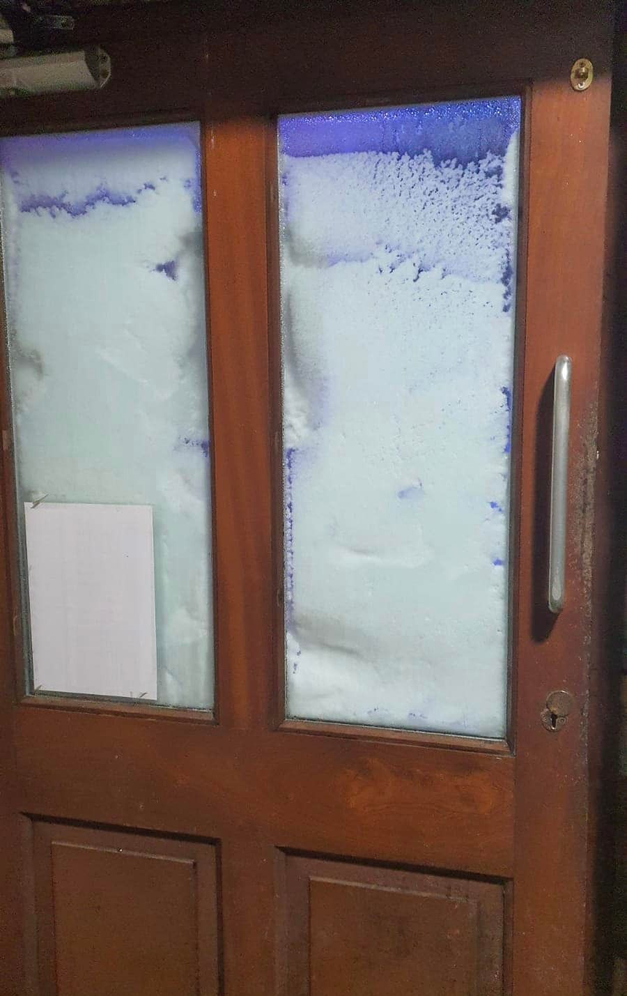 Snow in the doorway of the Tan Hill Inn, in the Yorkshire Dales.