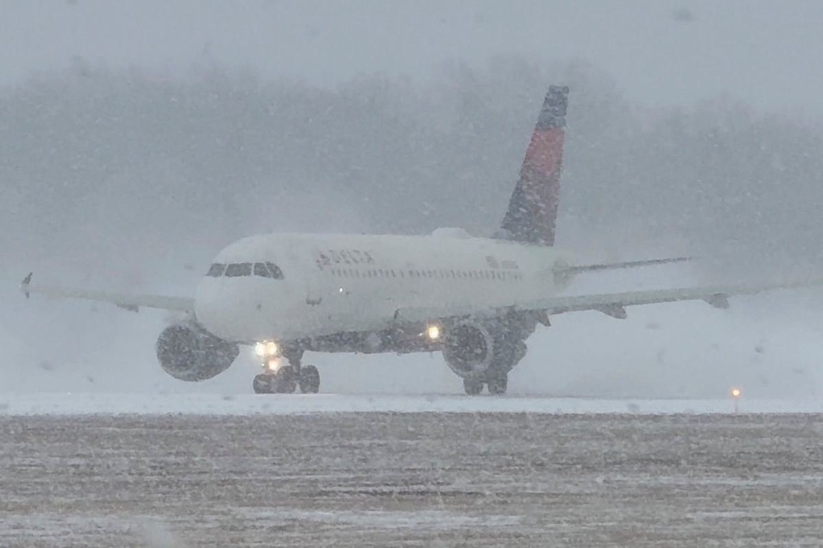 Snowbound plane at Greater Rochester International Airport