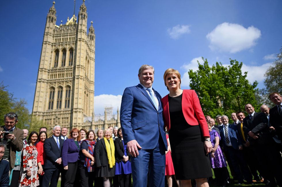 SNP frontbencher Angus Robertson has been criticised after comparing the gender reform bill to Nelson Mandela's fight against apartheid