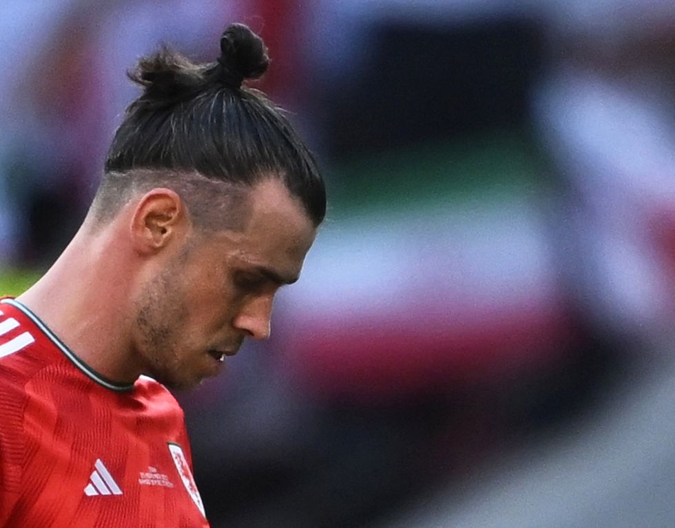 Soccer Football - FIFA World Cup Qatar 2022 - Group B - Wales v Iran - Ahmad Bin Ali Stadium, Al Rayyan, Qatar - November 25, 2022 Wales' Gareth Bale looks dejected after the match REUTERS/Dylan Martinez