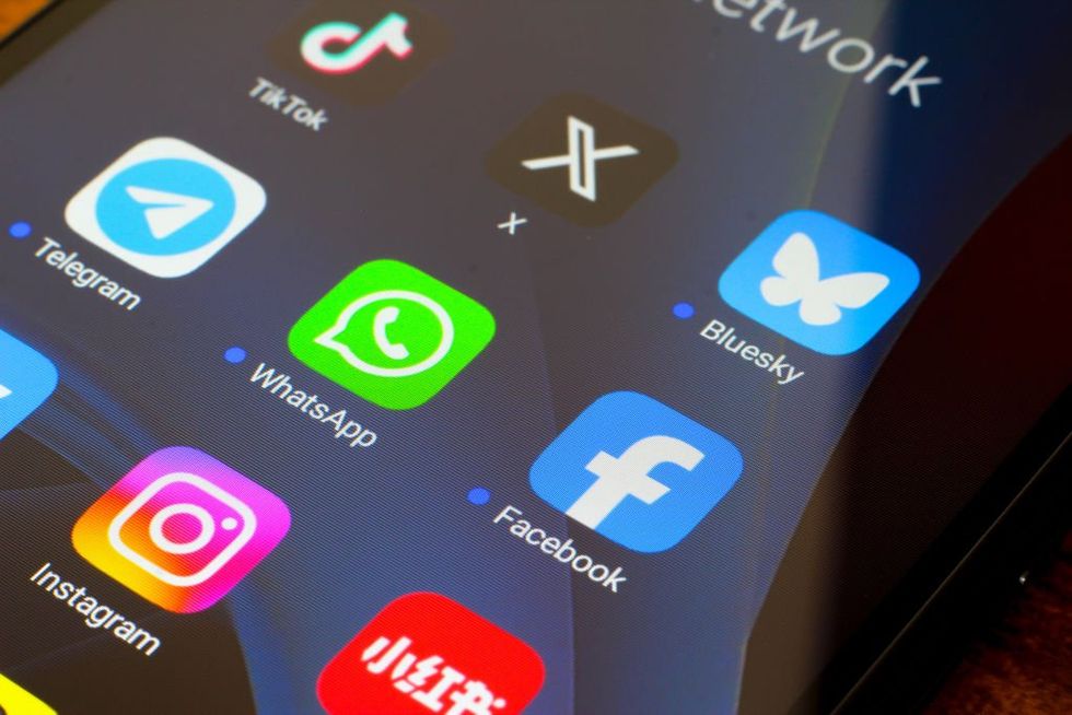 Social media apps on mobile display screen