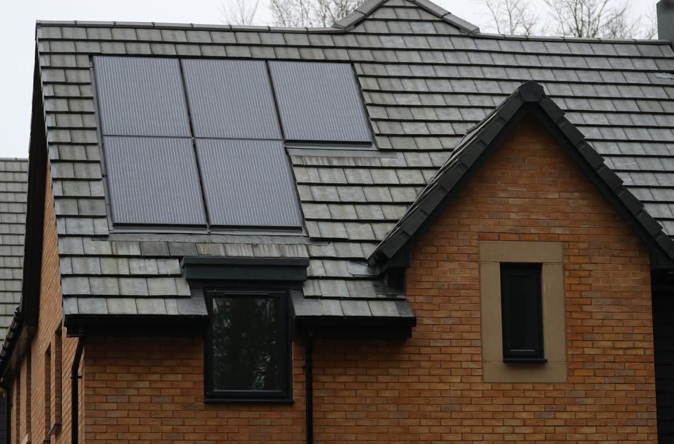 Solar panels on the roof of a property on a housing development in Basingstoke, Hampshire. PA Photo. Picture date: Tuesday January 7, 2020. Photo credit should read: Andrew Matthews/PA Wire