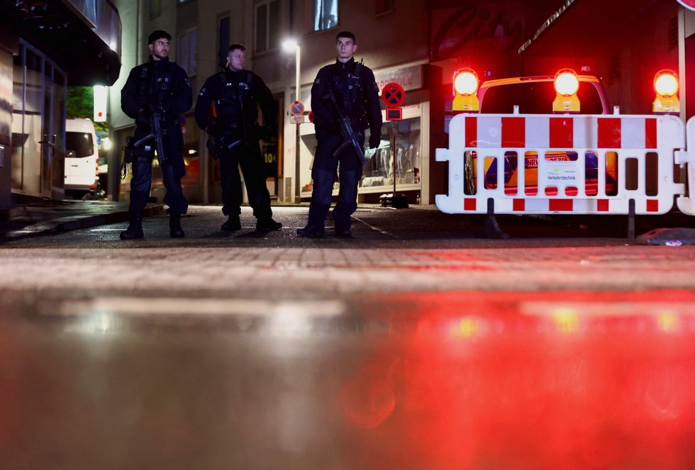 Solingen stabbing - Police stand guard at the scene