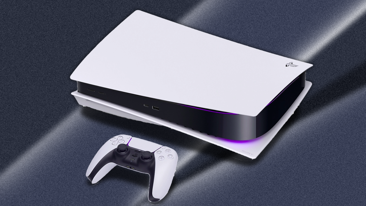 sony ps5 console pictured lying on its side with a wireless dualsense controller