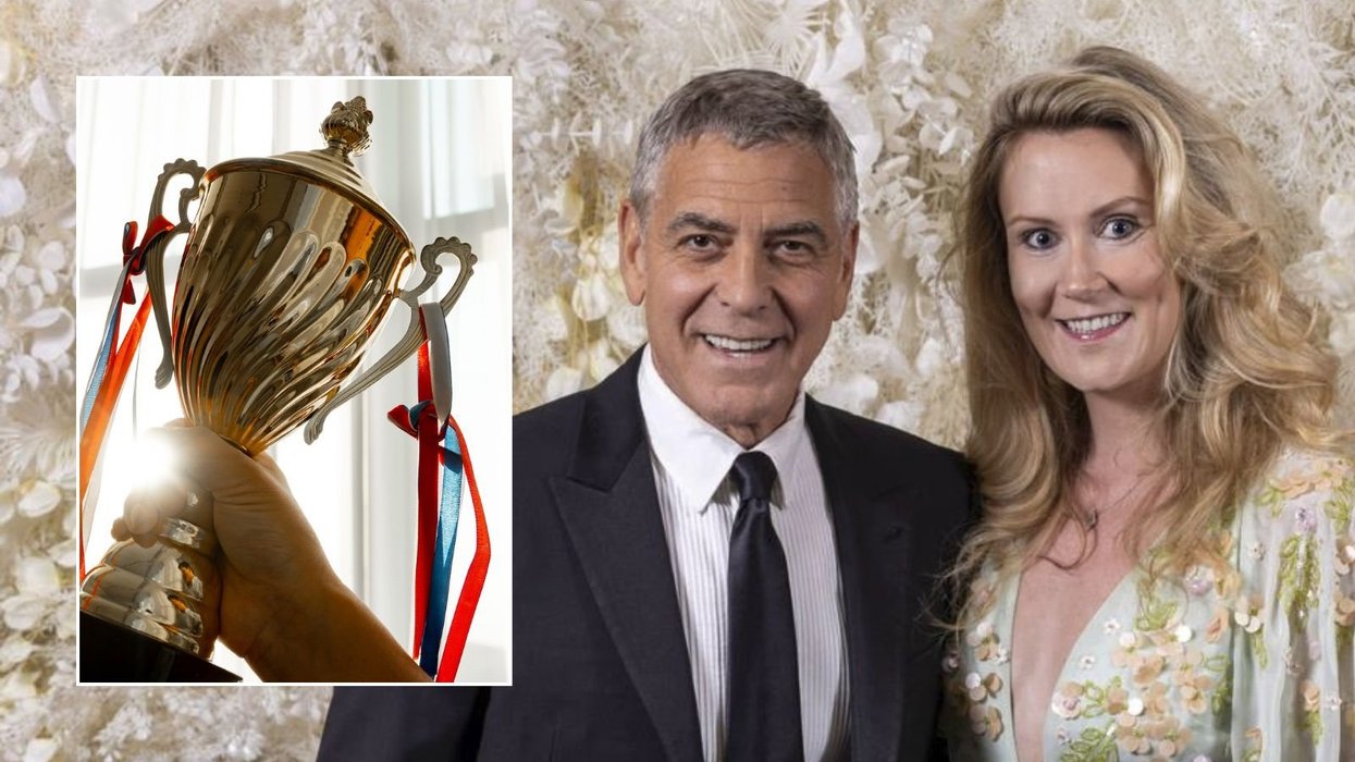 Sophia Hayes and George Clooney at award show, trophy