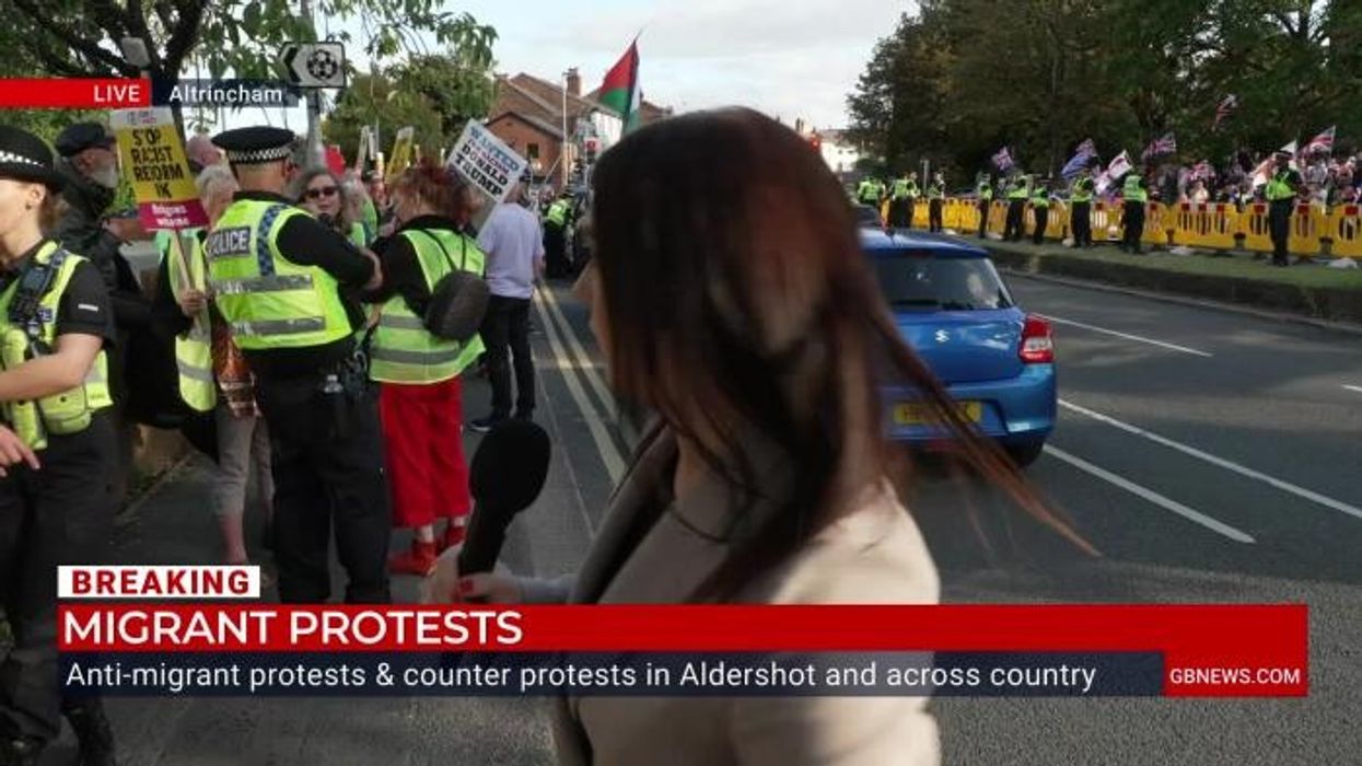 ‘I’ve just been assaulted’: Moment GB News reporter Sophie Reaper 'assaulted' by counter protesters as she tries to report on anti-migrant demonstrations
