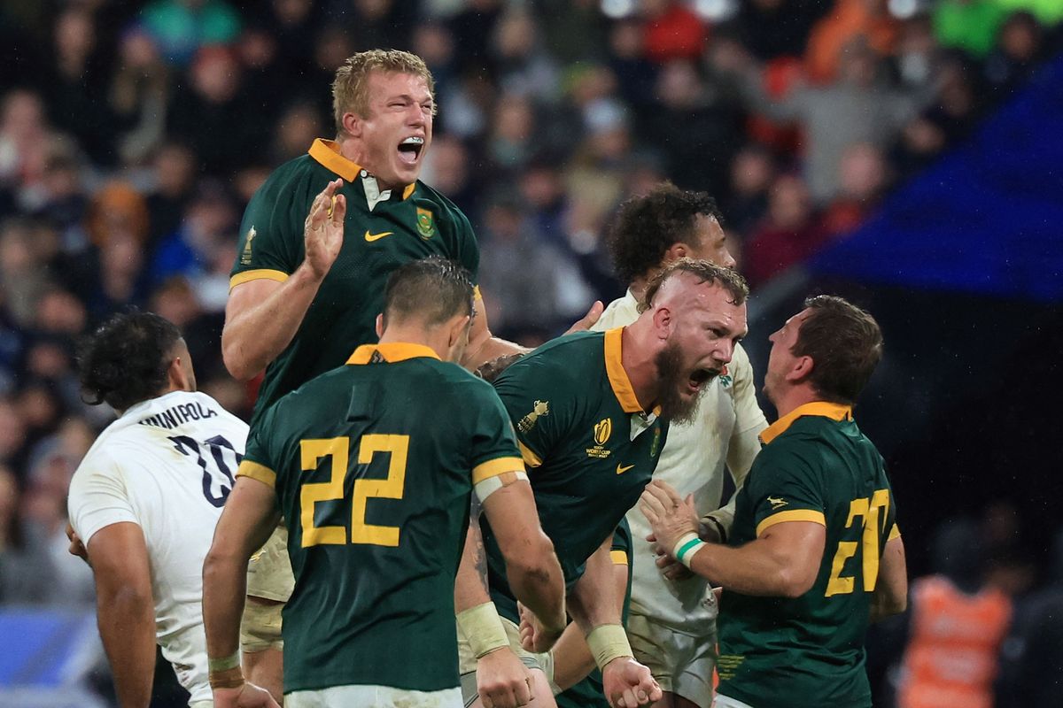 South Africa's lock RG Snyman (2nd R) celebrates with teammates after scoring a try during the France 2023 Rugby World Cup semi-final match between England and South Africa at the Stade de France in Saint-Denis, on the outskirts of Pari