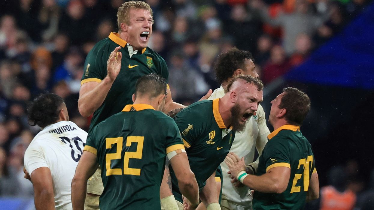South Africa's lock RG Snyman (2nd R) celebrates with teammates after scoring a try during the France 2023 Rugby World Cup semi-final match between England and South Africa at the Stade de France in Saint-Denis, on the outskirts of Pari