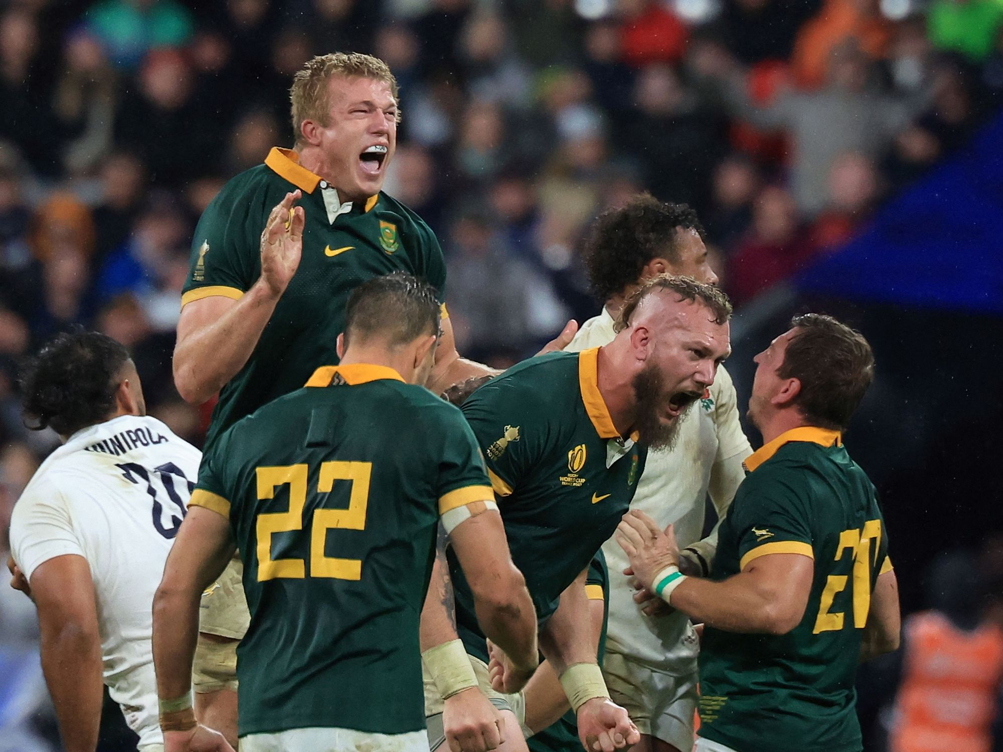 South Africa's lock RG Snyman (2nd R) celebrates with teammates after scoring a try during the France 2023 Rugby World Cup semi-final match between England and South Africa at the Stade de France in Saint-Denis, on the outskirts of Pari