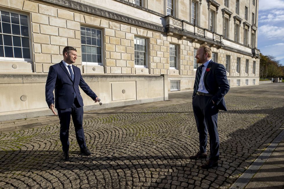 South Down MLA for the SDLP Colin McGrath (left) talks to Antrim East MLA for the UUP John Stewart at the Stormont Buildings in Belfast