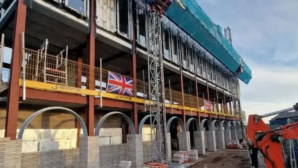 South Lakes Islamic Centre construction Union Jack flags placed