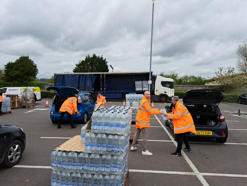 Southern Water staff with bottled water