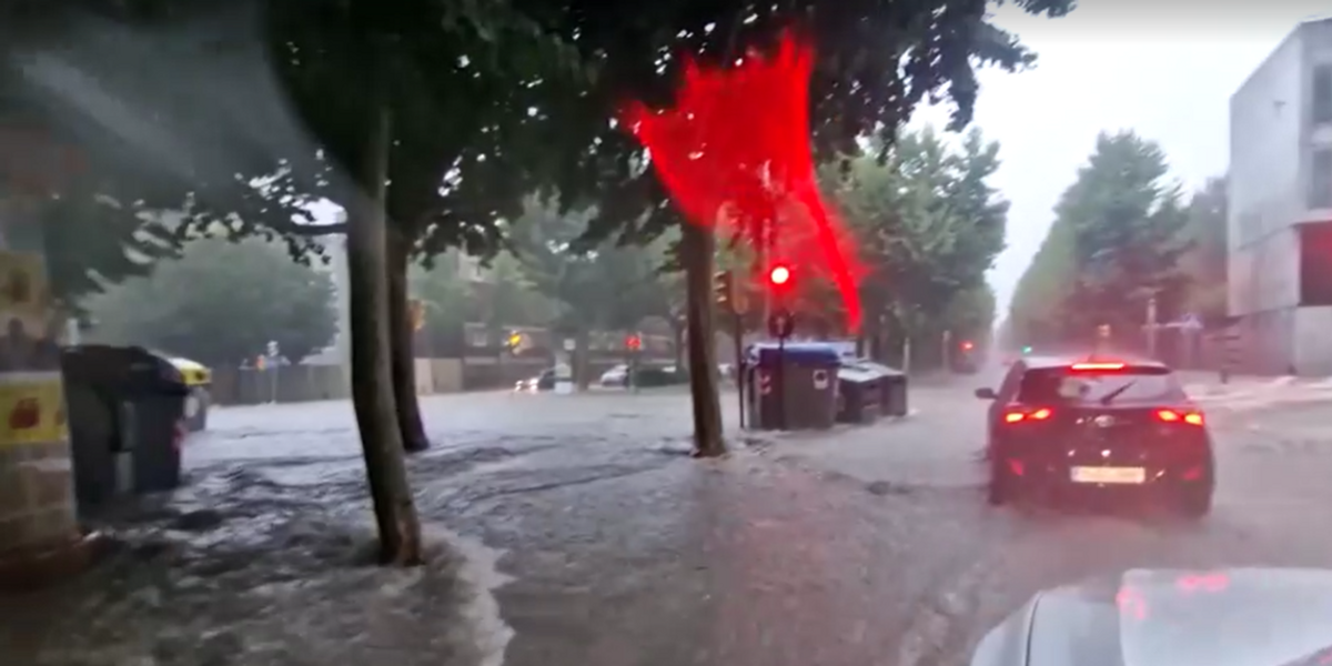 NextImg:Spain rocked by floods as 42C 'heat dome' wreaks havoc for Britons in holiday hotspots