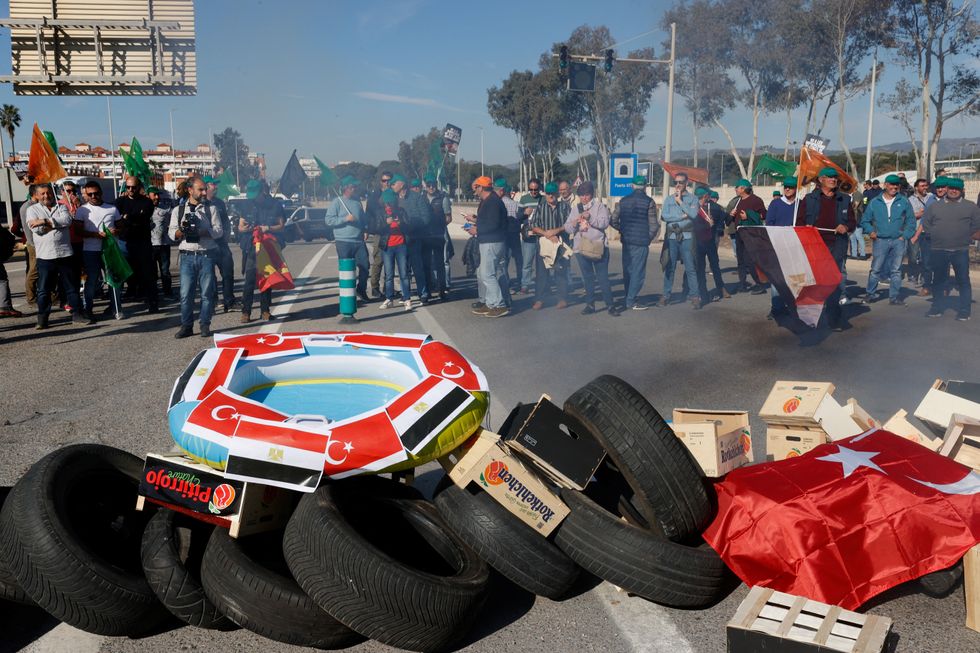 Spanish farmers block access to the Castellon port during a protest