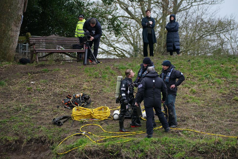 Specialist search teams from Lancashire Police, beside the bench where Nicola Bulley's phone was found, on the banks of the River Wyre, in St Michael's on Wyre, Lancashire, as the search continues for the missing woman who was last seen on the morning of Friday January 27, when she was spotted walking her dog on a footpath by the river. Picture date: Thursday February 2, 2023.