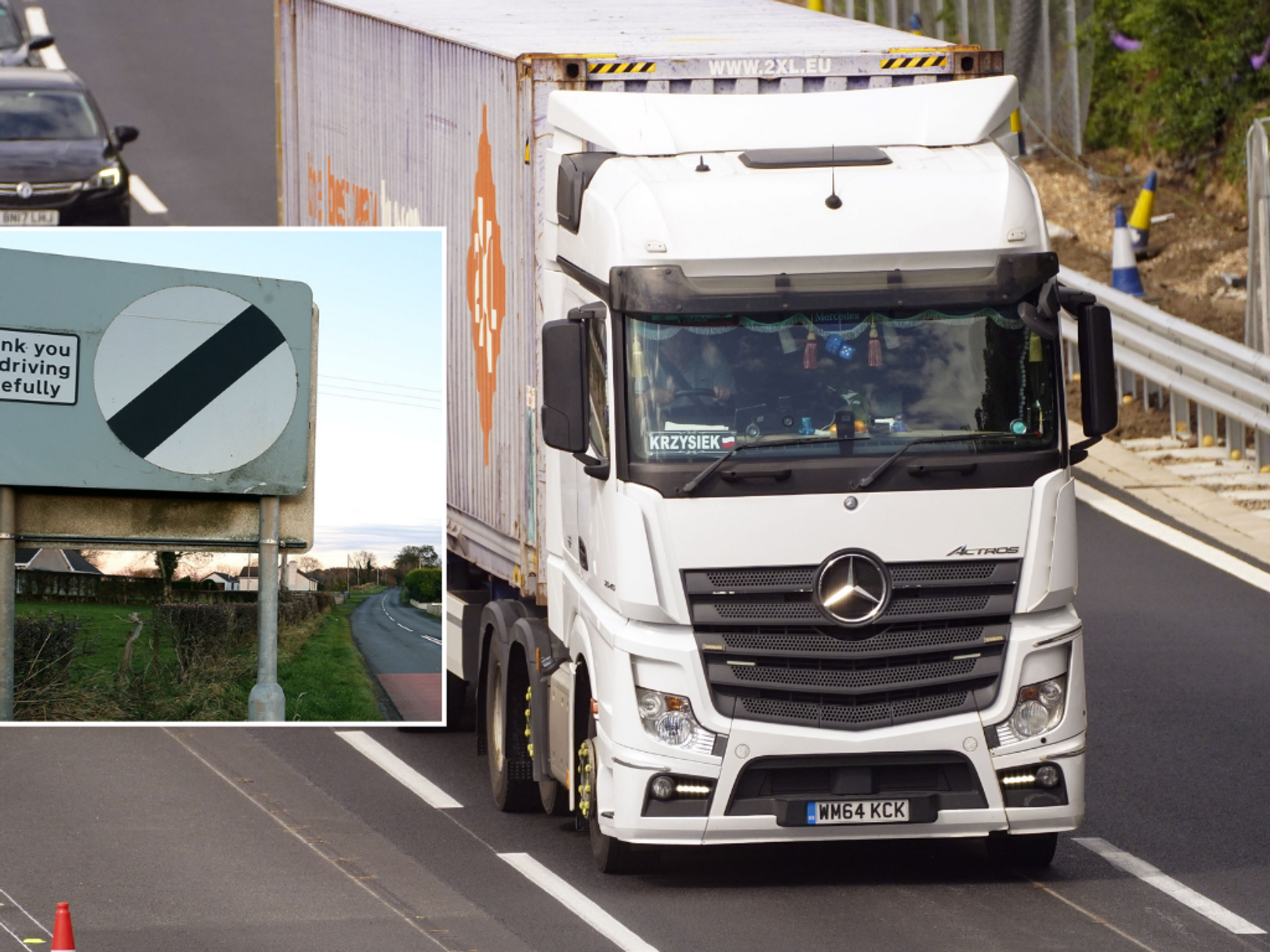 speed limit sign and a HGV