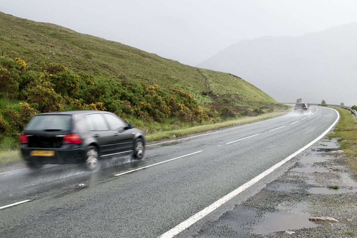 Speeding car on rural road