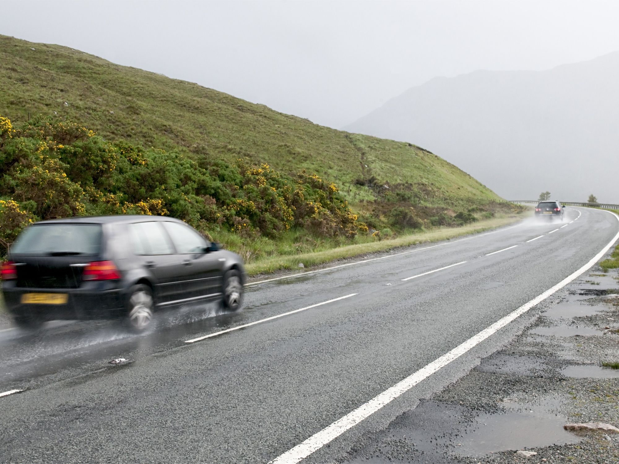 Speeding car on rural road