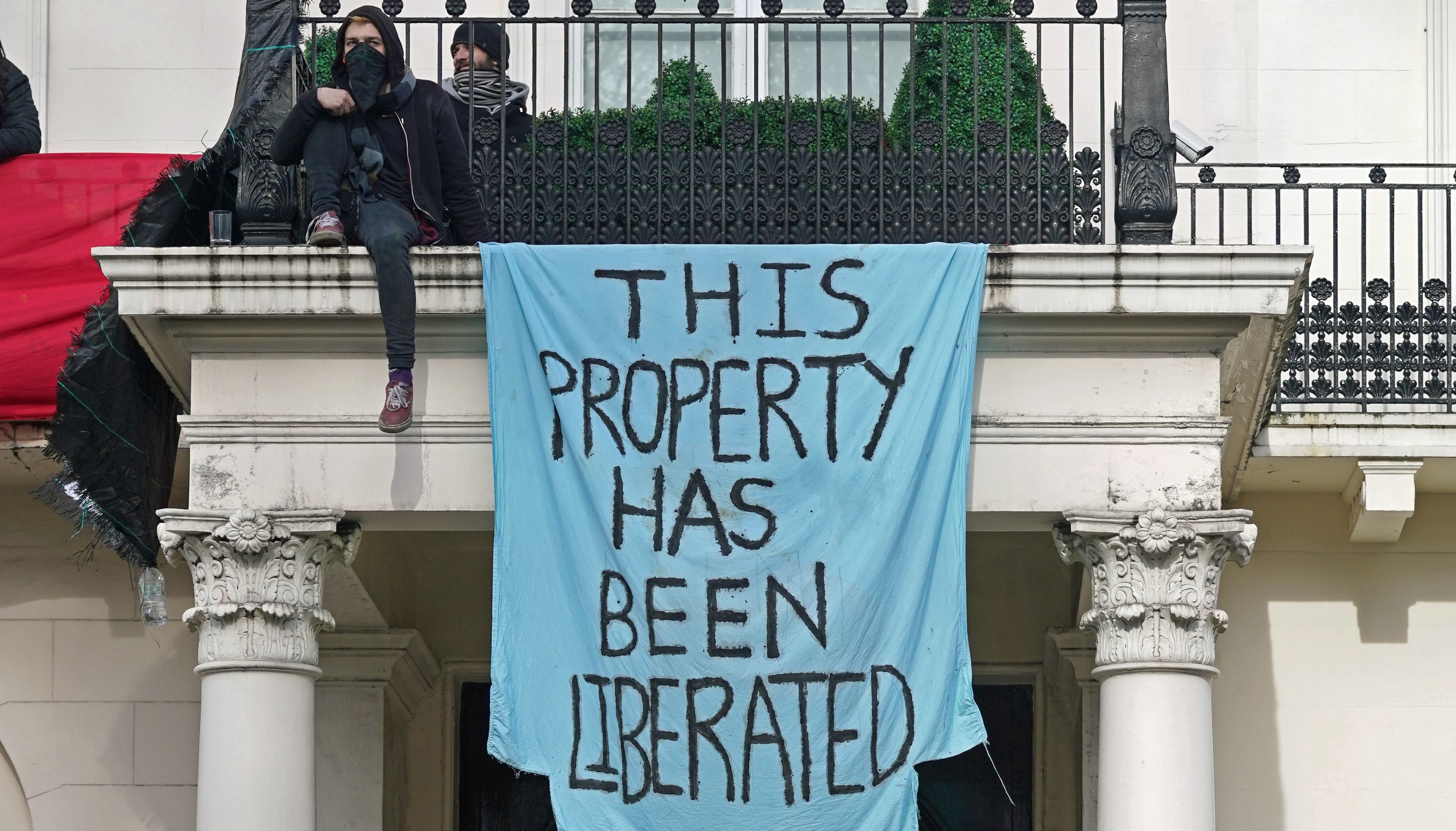 Squatters occupying a mansion belonging to Russian oligarch Oleg Deripaska in Belgrave Square, central London. Mr Deripaska, who has stakes in energy and metals company En+ Group, is one of the seven Russian oligarchs with business empires, wealth and connections that are closely associated with the Kremlin who have been sanctioned by the UK Government. Picture date: Monday March 14, 2022.