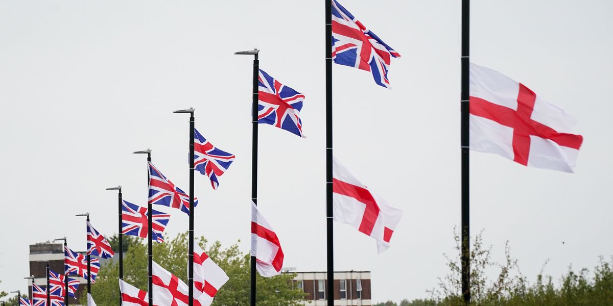 Britons raising Union Jacks on busy road ‘attacked’ by locals who ‘punched and kicked them’ Britons raising Union Jacks on busy road ‘attacked’ by locals who ‘punched and kicked them’