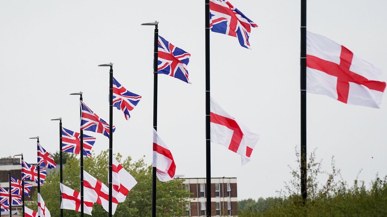 St George's and Union Flags fly by a roadside
